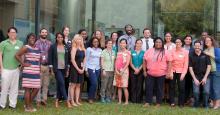 Students in the Graduate Summer Opportunity to Advance Research Program smile for a photo